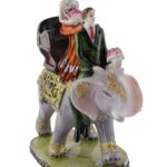Love Couple Sitting on Elephant Statue